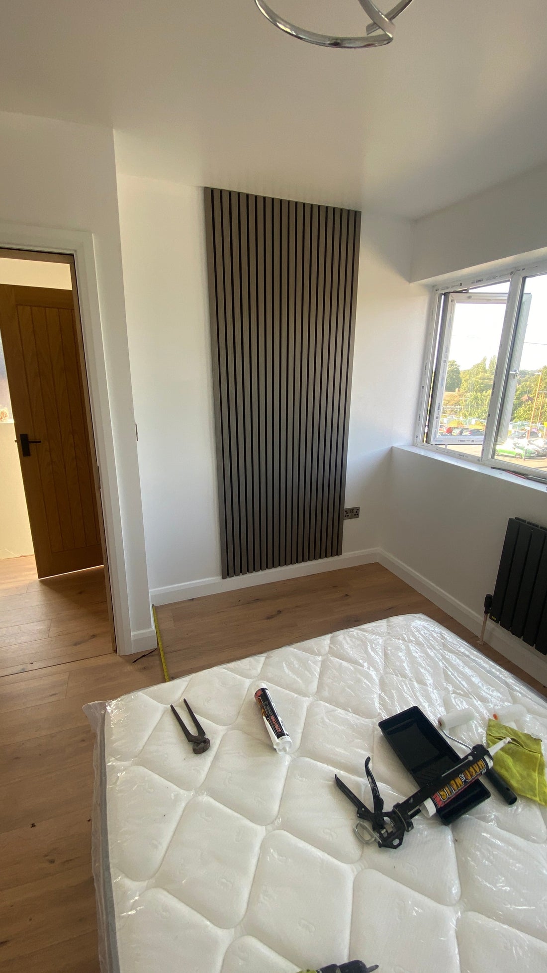 Wall panel getting installed on the wall